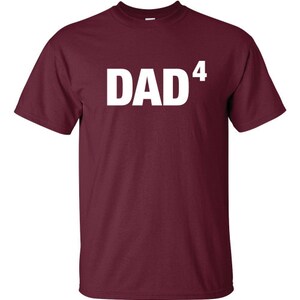 May include: Burgundy t-shirt with white text that reads "DAD^4".