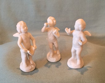 Vintage White Porcelain Cherub Figurines: Musical Angel Trio