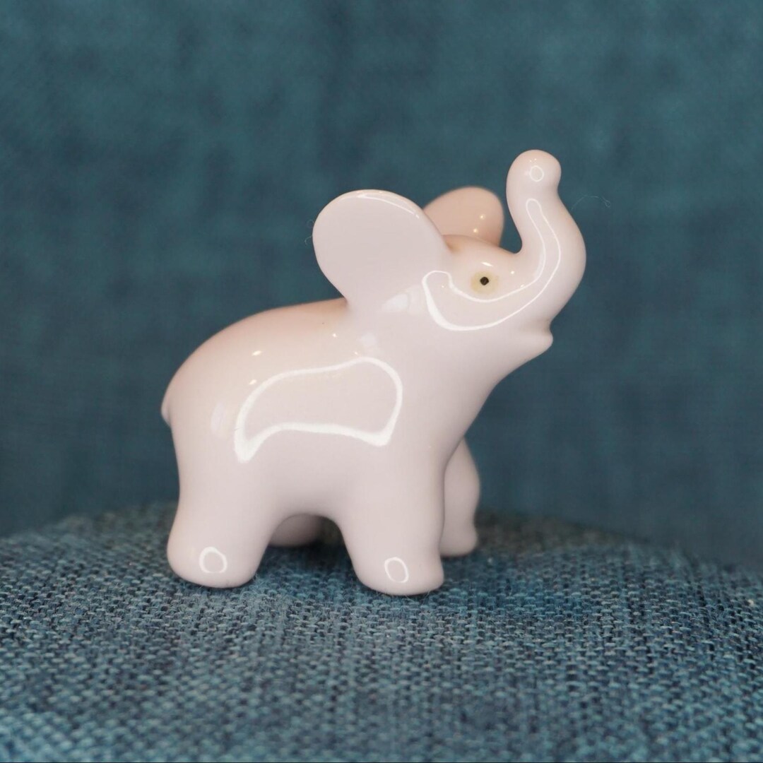 ELEPHANT CUB FIGURINE
