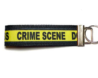 True Crime Keychain: Crime Scene Tape Wristlet