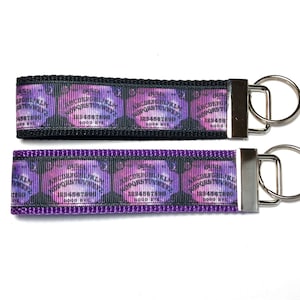 Galaxy Ouija Keychain, Galaxy, Ouija board, Spirit board keychain, Halloween, Horror Keychain, Goth, Horror, Spooky