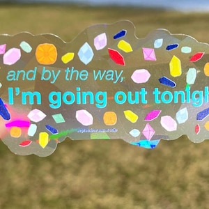 May include: A clear sticker with a colorful confetti design and the text "and by the way, I'm going out tonight."