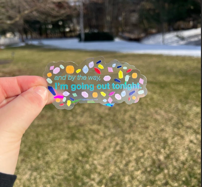 May include: A clear sticker with a colorful confetti design and the text "and by the way, I'm going out tonight."