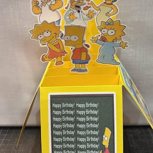 The Simspons Inspired card in  a box
