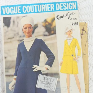 May include: Vintage Vogue Couturier Design sewing pattern featuring a navy blue wrap dress and a yellow coat design. The pattern includes the text "Galitzine of Italy 2159" and "VOGUE COUTURIER DESIGN".