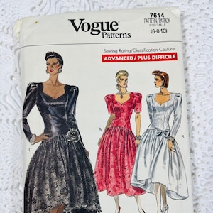 May include: Vogue sewing pattern 7614 for sizes 6-8-10. The pattern is for an advanced sewing project and includes three different dress styles. The dresses are shown in black, red, and white. The pattern is labeled "Not Paid Fabric Land".