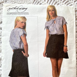 May include: A sewing pattern for a skirt and top. The pattern is for sizes 4-6-8-10. The pattern is by Rachel Comey and is a Vogue pattern.