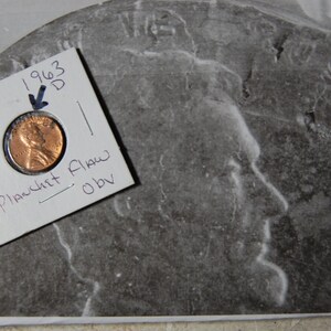 1963 D  PENNY- Error in Mint production---Planchet Flaw Obv Top 25%   See picks