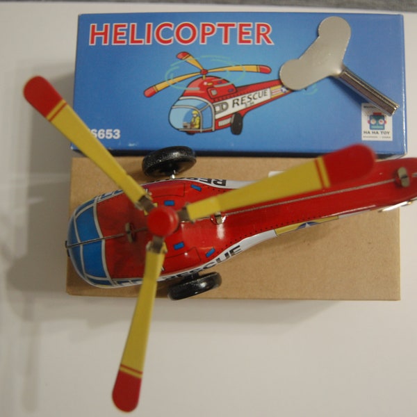 Helicopter--Miniature Prop Spinning Wind up Tin Toy---Brand New in the Box-see pics-