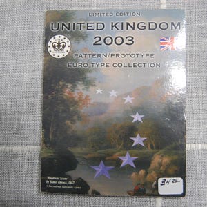 May include: A Limited Edition United Kingdom 2003 Euro Type Collection card. The card features a landscape painting with purple star accents and the text "United Kingdom 2003". The Union Jack flag is visible.