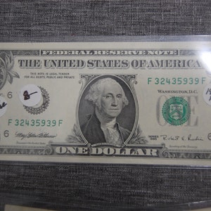 1995 --One Dollar Federal Reserve -Error Note-F enlarged on upper serial-  Printed for Atlanta .  Federal Res.  Bank-UC/Crisp--Ungraded--