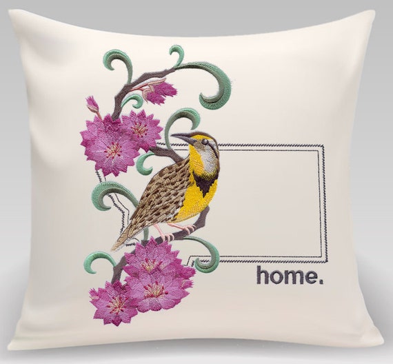 Montana Western Meadowlark and Bitterroot Medley. Embroidered with feather insert