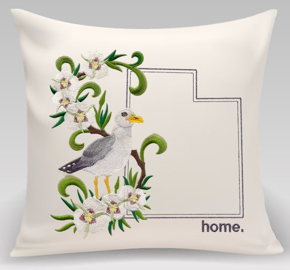 Utah Gull and Sego Lily Medley. Embroidered with feather insert