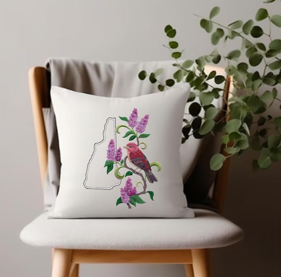 New Hampshire Purple Finch and Purple Lilac Medley. Embroidered with feather insert