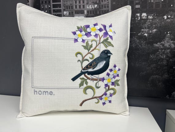 Colorado Lark Bunting and Columbine Medley. Embroidered with feather insert