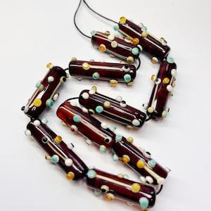 Handmade lamp work glass beads