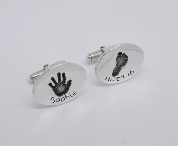 handprint cufflinks
