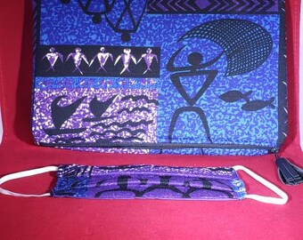 May include: A rectangular blue and purple fabric clutch bag featuring a black graphic print of stylized figures, fish, and geometric patterns, accompanied by a matching pleated fabric face mask with white elastic ear loops.