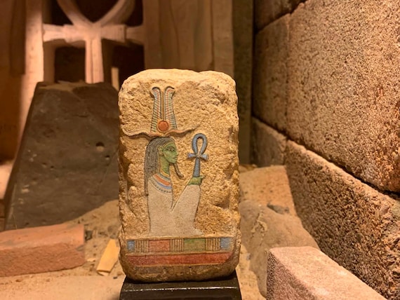 Egyptian art - painted relief sculpture of the God Osiris. Mythology of ancient Egypt. Supreme deity of the afterlife