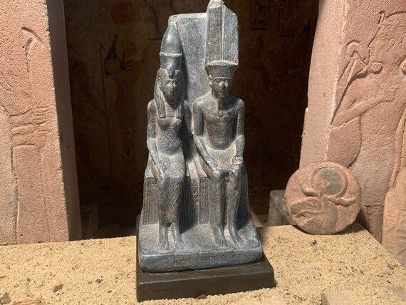 Egyptian museum statue replica of the God Amun & wife Mut. Ancient Egyptian mythology