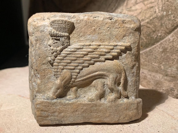 Mesopotamia art - Assyrian winged bull relief sculpture amulet