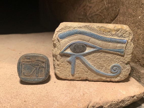 Egyptian Art - Eye of Horus & Ra amulets. Ancient Egypt carving / Sculpture