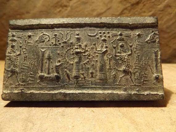 Ishtar - Mesopotamia - Assyrian cylinder seal impression. Astronomical motif