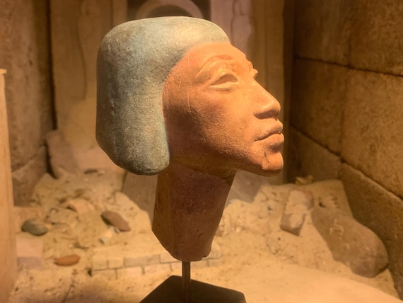 Egyptian statue of Akhenaten - harp or chair / throne figurehead. Amarna art