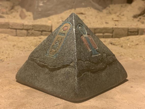 Egyptian Pyramid featuring Maat, the Tyet knot of Isis / Aset, cartouche of Thutmose & a lotus flower.