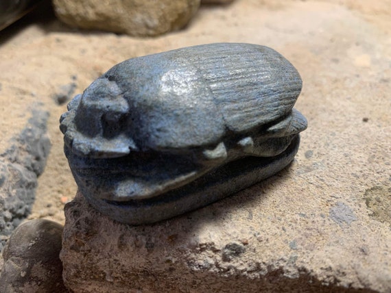 Egyptian art - King Tutankhamun scarab amulet featuring his name in hieroglyphs