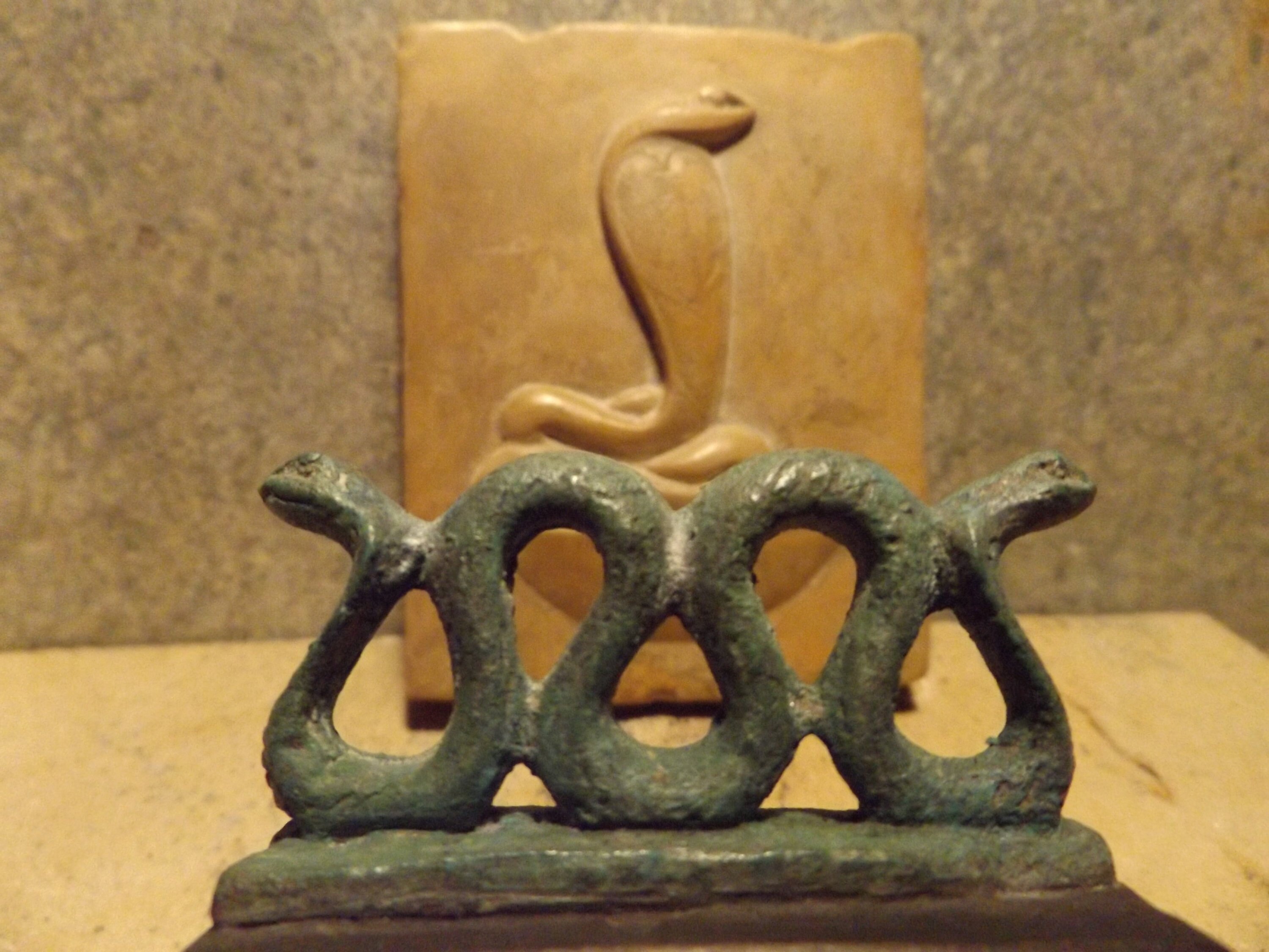 Egyptian statue and relief Serpent of the Nile cobra statuette