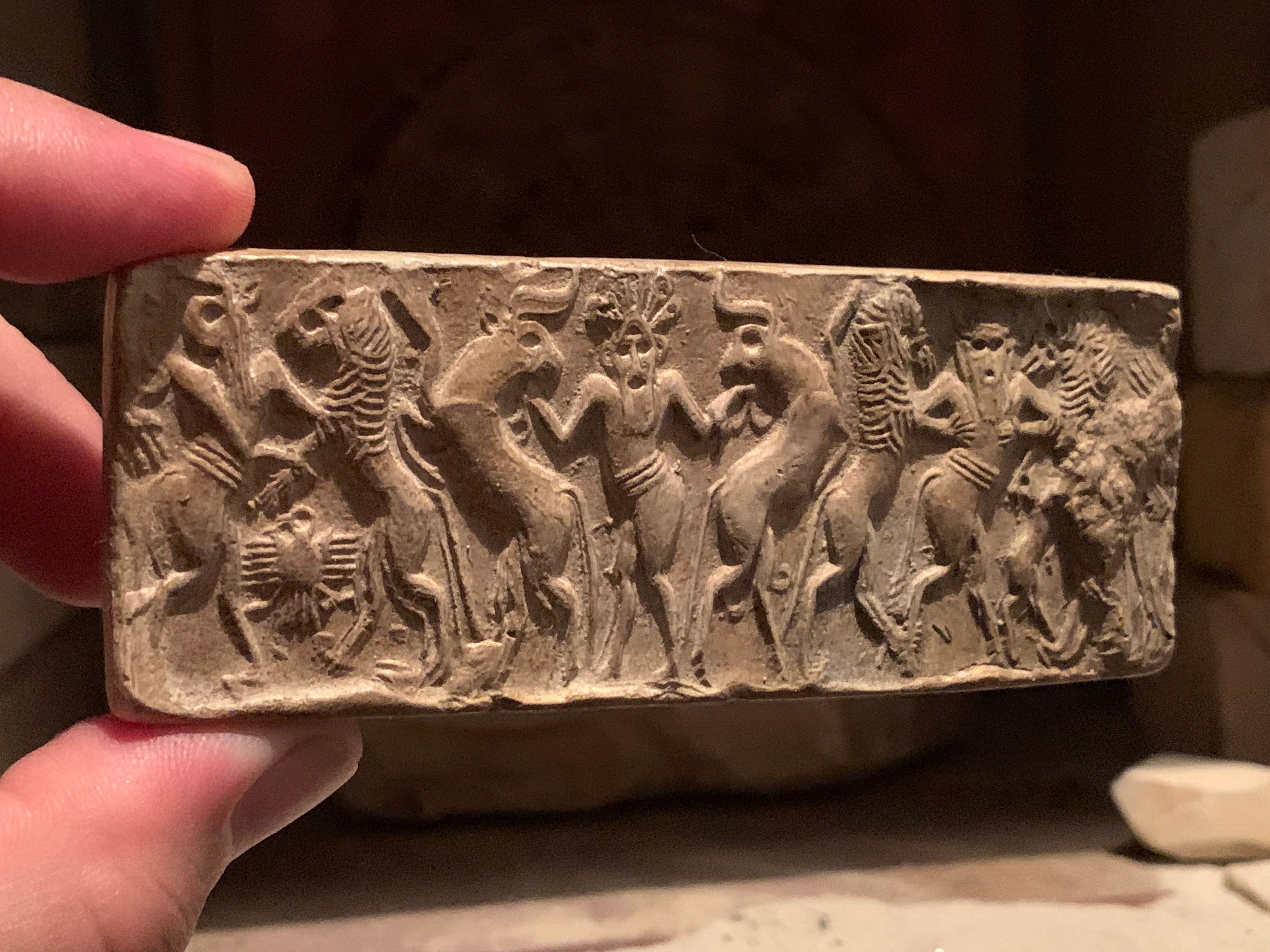 Sumerian cylinder seal impression Master of animals. Museum replica