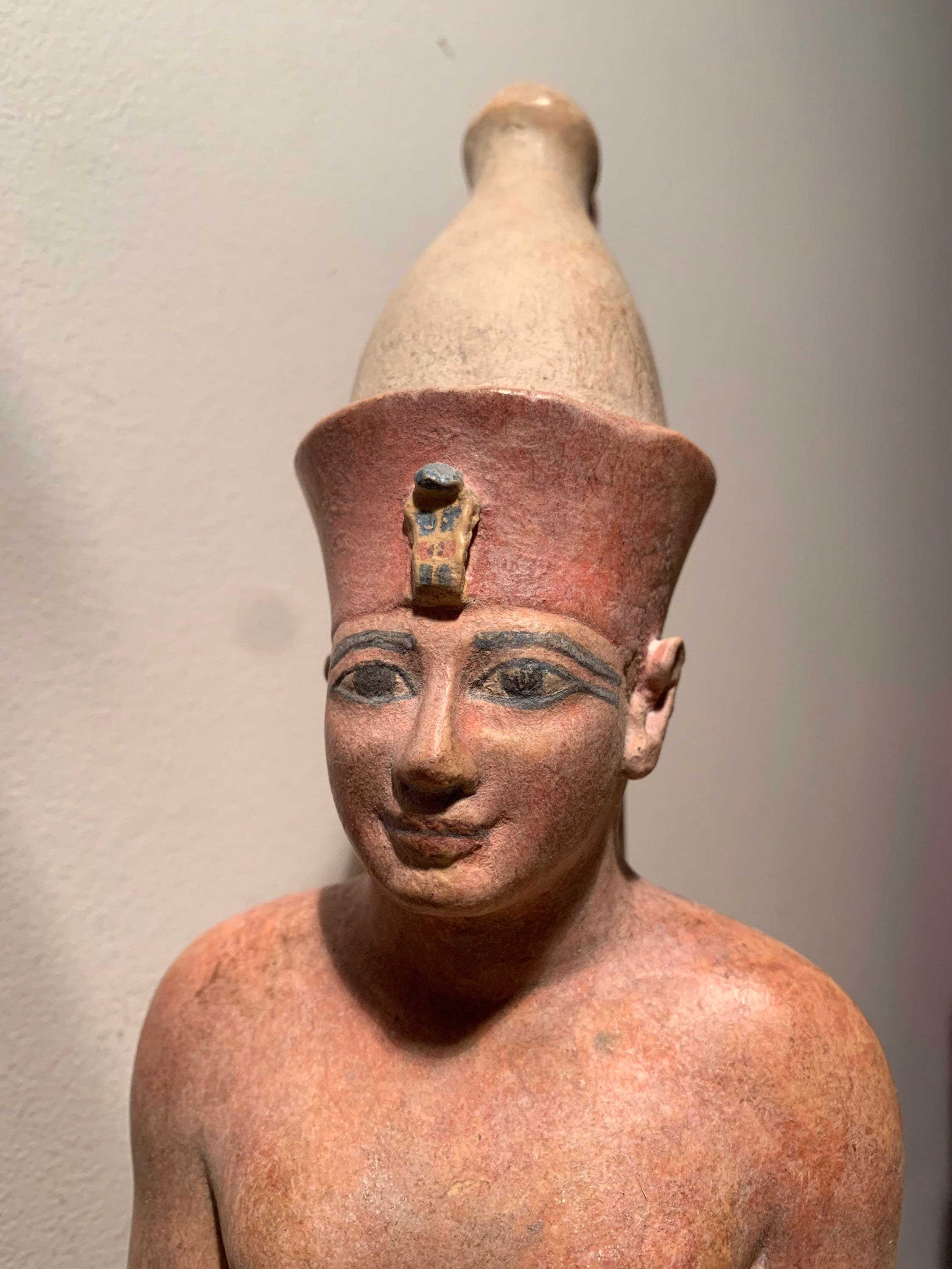 Egyptian statue of Amenhotep II kneeling with ‘Nu’ Jars and wearing the