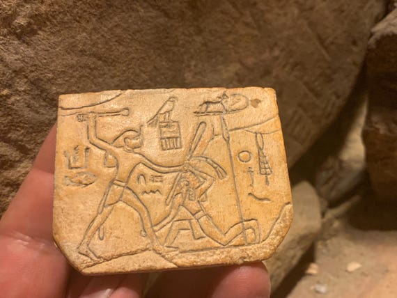 Egyptian art - King Den 1st dynasty sandal docket featuring early Hieroglyphic text