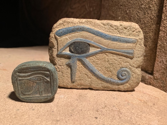Egyptian Art - Eye of Horus & Ra amulets. Ancient Egypt carving / Sculpture