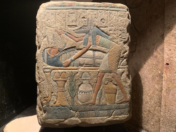 Egyptian art / sculpture - Anubis tending a mummy - opening of the mouth ritual. God of mummification