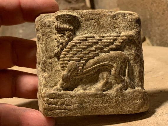Mesopotamia art - Assyrian winged bull relief sculpture amulet