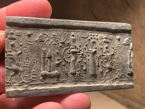 Ishtar - Mesopotamia - Assyrian cylinder seal impression. Astronomical motif