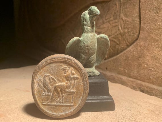 Zeus and Aquila Ancient Greek / Roman art. Eagle statue and amulet. Carrier of lightning bolts.