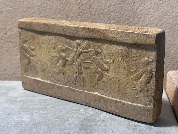 Mesopotamia Assyrian cylinder seal impression - Annunaki / Apkallu / Hero wrestling winged griffins