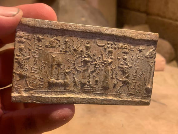 Ishtar - Mesopotamia - Assyrian cylinder seal impression. Astronomical motif