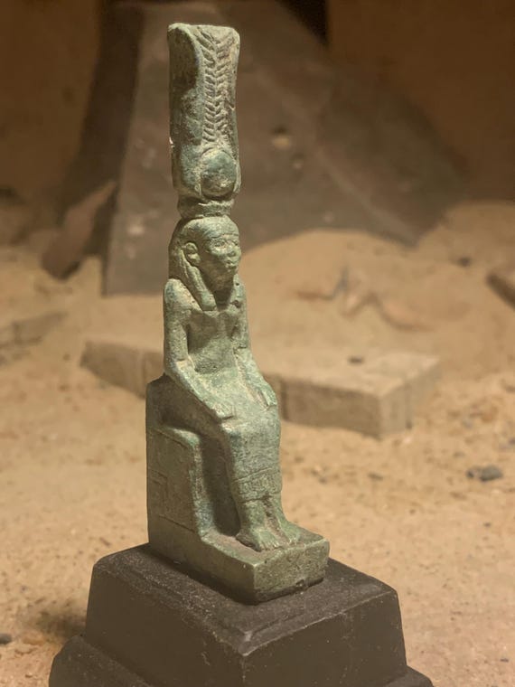 Egyptian statue - Isis - Great mother goddess of magic. Petite seated figure