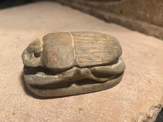 Egyptian art - King Tutankhamun scarab amulet featuring his name in hieroglyphs