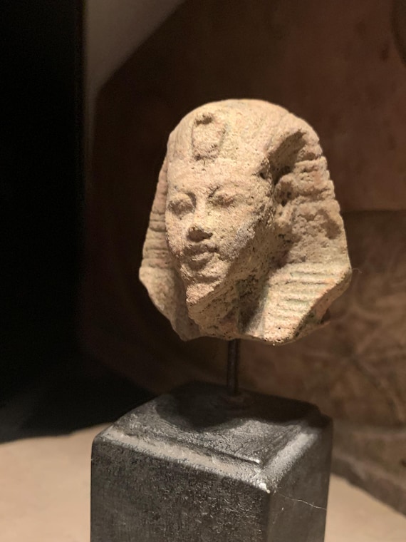 Egyptian statue bust replica fragment of King Tutankhamun 18th dynasty. Post Amarna period art