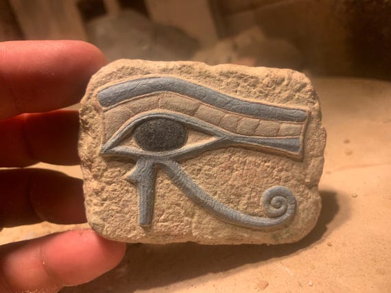 Egyptian Art - Eye of Horus amulet. Ancient Egypt carving / Sculpture
