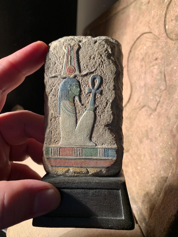 Egyptian art - painted relief sculpture of the God Osiris. Mythology Ancient Egypt. Supreme deity of the afterlife