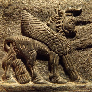 Mesopotamia / Assyrian art / mythology - Lamassu winged bull amulet replica