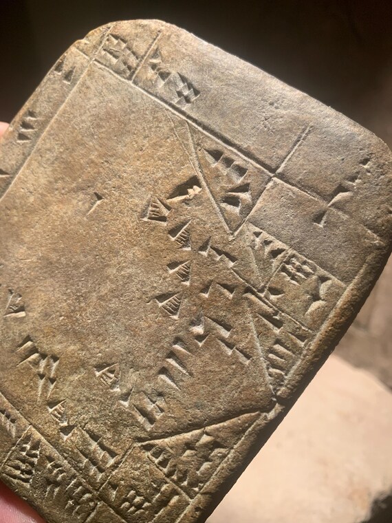 Sumerian / Mesopotamian cuneiform writing - mathematical tablet - calculation of the surface area of residential land.