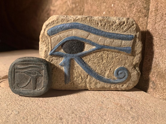 Egyptian Art - Eye of Horus & Ra amulets. Ancient Egypt carving / Sculpture