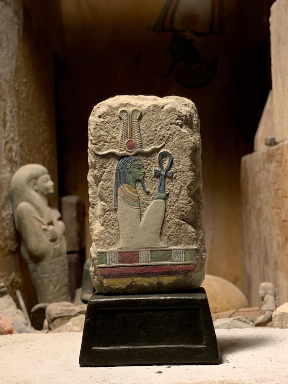 Egyptian art - painted relief sculpture of the God Osiris. Mythology of ancient Egypt. Supreme deity of the afterlife